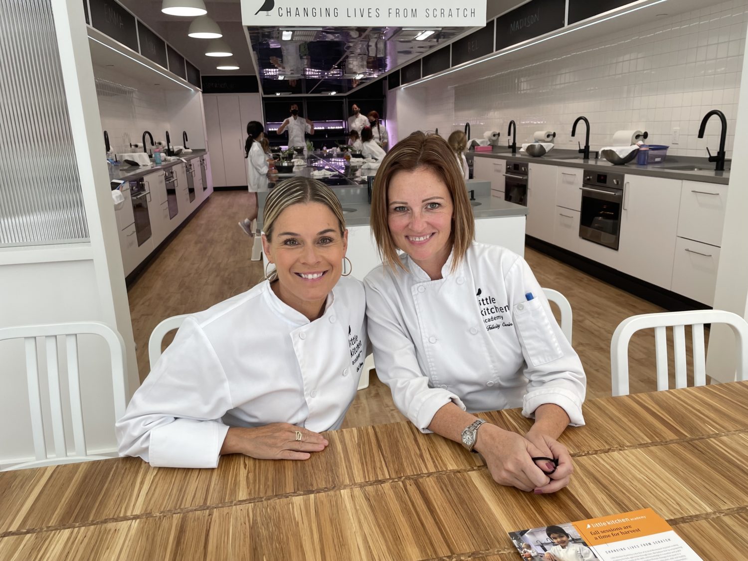 https://www.laweekly.com/wp-content/uploads/2021/08/Little-Kitchen-AcademyChef-Cat-Cora-and-Founder-Felicity-Curin-sitting-at-the-chopstick-table-Michele-Stueven.jpg